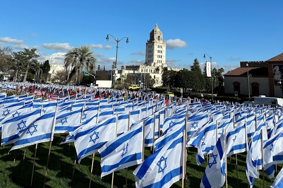City Marks Solemn Anniversary of Devastating Hamas Attacks with Memorial Ceremony and 1,400 Flags