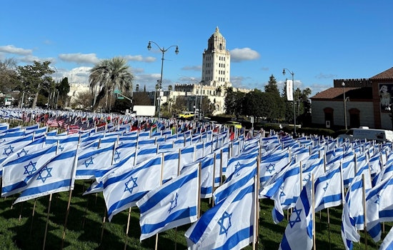 City Marks Solemn Anniversary of Devastating Hamas Attacks with Memorial Ceremony and 1,400 Flags