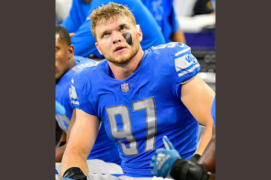 Detroit Lions Celebrate Win Amid Aidan Hutchinson's Serious Leg Injury, Team Optimistic After Successful Surgery