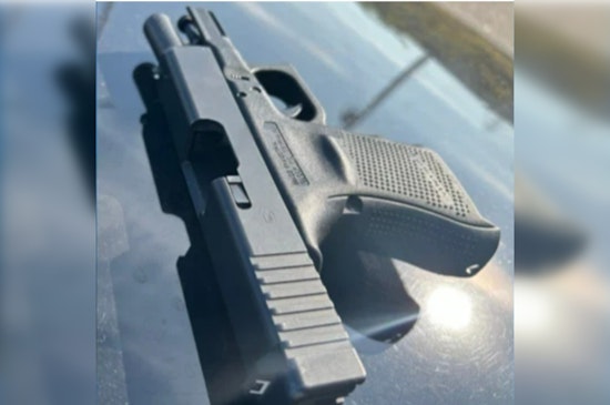 Gaines Township Chase Leads to Two Arrests; Marijuana, Cash, and Firearm Seized