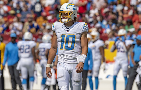 Herbert Helms Chargers to 23-16 Victory Over Broncos Amidst Surtain's Injury Exit