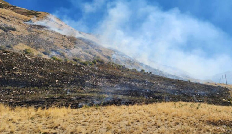Unyielding Wildfire Engulfs 600 Acres in Tooele County, Human Actions Interfere with Aerial Firefighting Efforts