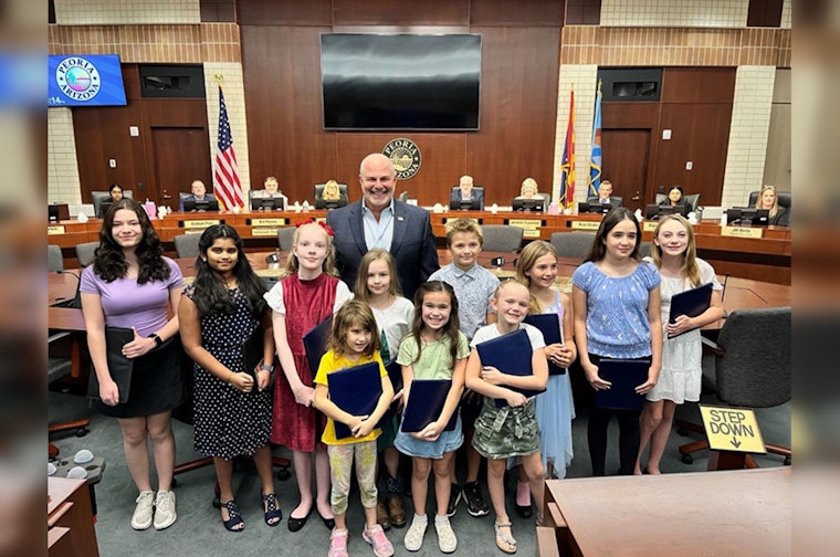Young Creatives Shine in Peoria as Library Card and Story Writing Contests Unveil Local Talent