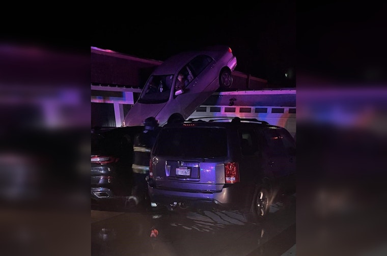 85-Year-Old Woman Unhurt After Car Launches from Garage Roof in West Seattle Mishap