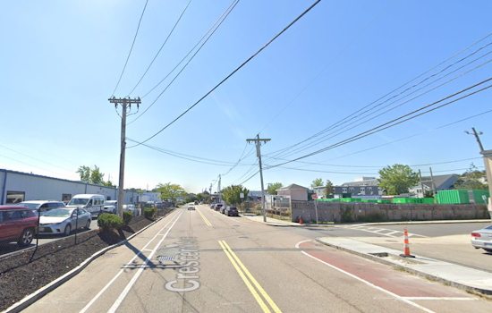 Massive Blaze Engulfs Historic Warehouse in Chelsea, Massachusetts, Disrupting Commuter Lines