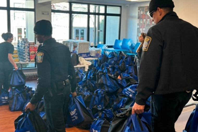 Boston Police and Madison Park Development Team Up to Distribute 1,000 Thanksgiving Meals in Roxbury