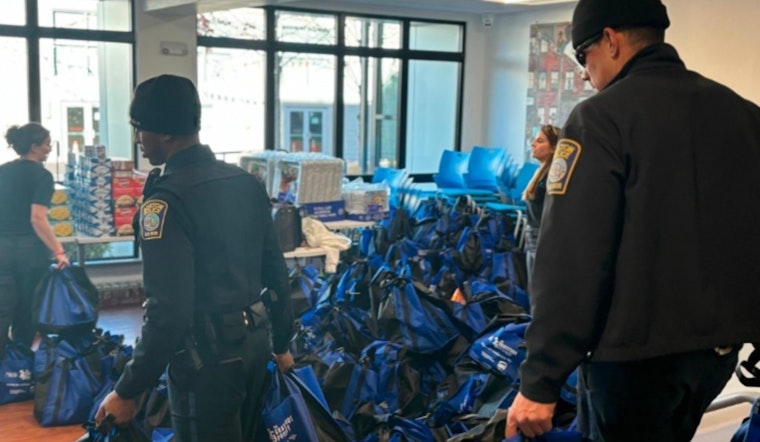 Boston Police and Madison Park Development Team Up to Distribute 1,000 Thanksgiving Meals in Roxbury
