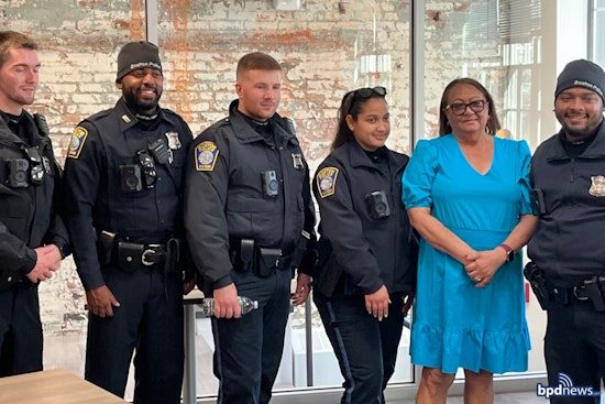 Boston Police and Whole Foods Bring Thanksgiving Cheer to Roxbury with Turkey and Gift Card Donations