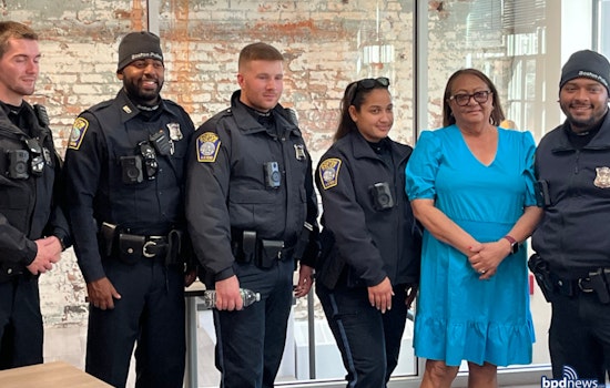 Boston Police and Whole Foods Bring Thanksgiving Cheer to Roxbury with Turkey and Gift Card Donations
