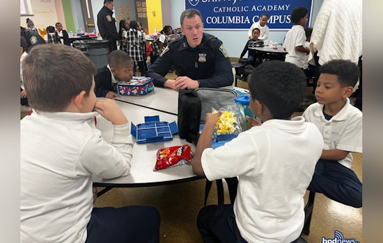 Boston Police Officers Build Bridges with Storytime at Dorchester's St. John Paul Catholic Academy