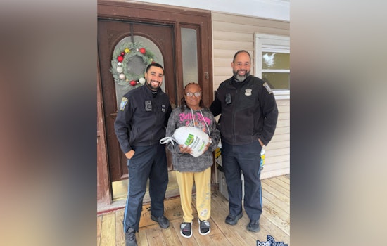 Boston Police Officers from District E-13 Serve Up Thanksgiving Cheer to Jamaica Plain Residents in Need