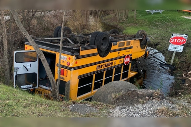 Driver Unharmed as School Bus Overturns into Pond After Crash in Racine County