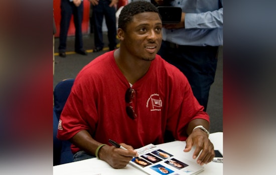 Former Atlanta Falcon Warrick Dunn Gifts New Homes to Single Mothers in Clayton County
