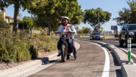 Irvine Unveils First Class IV Protected Bikeway and Eco-Friendly Electric Street Sweeper in Green Transport Push