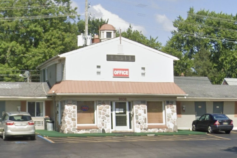 One Dead in Domestic-Related Shooting at Redford Township Motel, Suspect in Custody Awaiting Charges