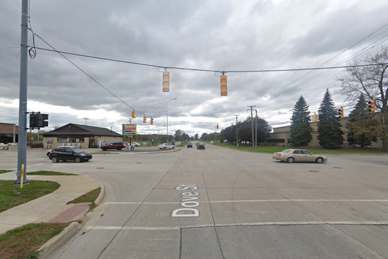 Police Car Collides with Pickup Truck after Driver Runs Red Light in Port Huron