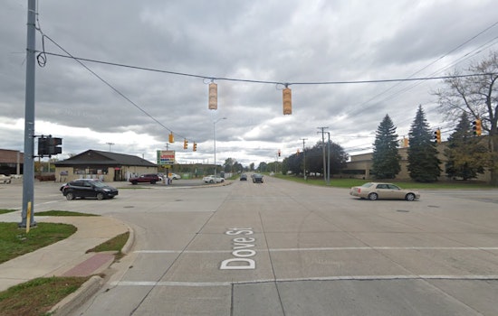 Police Car Collides with Pickup Truck after Driver Runs Red Light in Port Huron