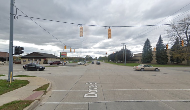 Police Car Collides with Pickup Truck after Driver Runs Red Light in Port Huron
