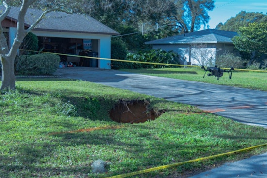 Second Sinkhole Opens Within Year on Polk County Home's Lawn, Homeowners Alerted