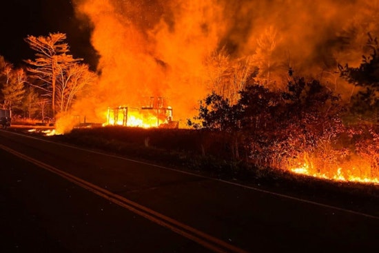 Suspected Arson in Kingston: Massive Blaze Engulfs Construction Garage, Spreads to Brush on South Shore