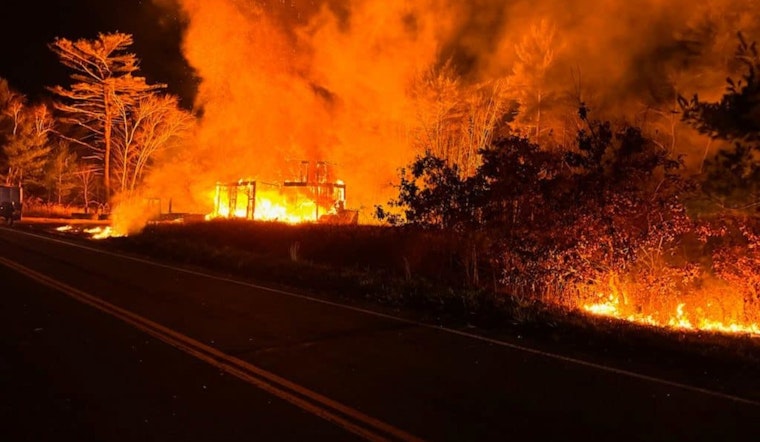 Suspected Arson in Kingston: Massive Blaze Engulfs Construction Garage, Spreads to Brush on South Shore