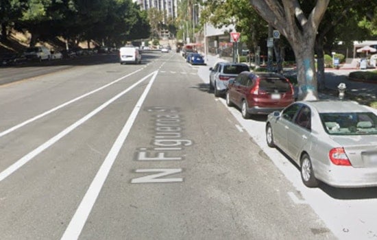 Woman Shot in Car in Downtown LA, LAPD Seeks Public's Aid to Identify Moped-Riding Suspect