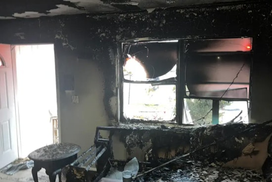 Alert Bystander With Garden Hose Saves Three from House Fire in Spring Hill