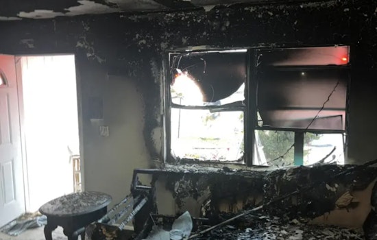Alert Bystander With Garden Hose Saves Three from House Fire in Spring Hill
