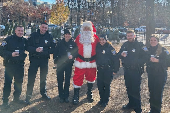 Boston Police Officers Embrace Community Spirit at South End's Festive Tree and Wreath Sale