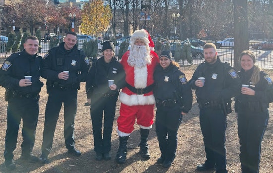 Boston Police Officers Embrace Community Spirit at South End's Festive Tree and Wreath Sale