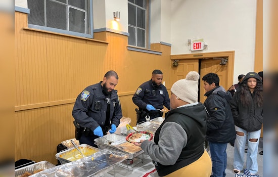 Boston Police Officers Serve Up Cheer at Ella J. Baker House Christmas Party