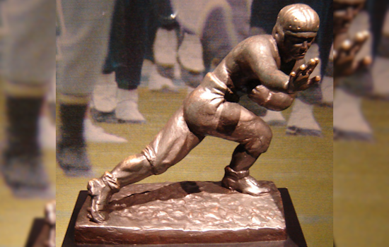 Century-Old Colorado Buffaloes Fan Strikes Iconic Heisman Pose in Show of Team Support