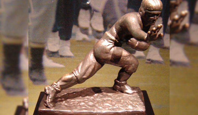 Century-Old Colorado Buffaloes Fan Strikes Iconic Heisman Pose in Show of Team Support