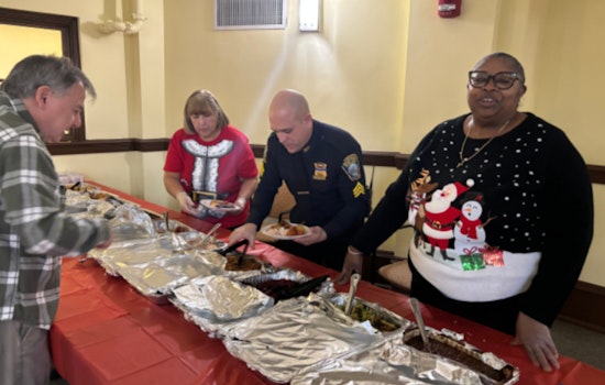 East Boston Police Bring Holiday Cheer to Seniors at Barnes School Apartments
