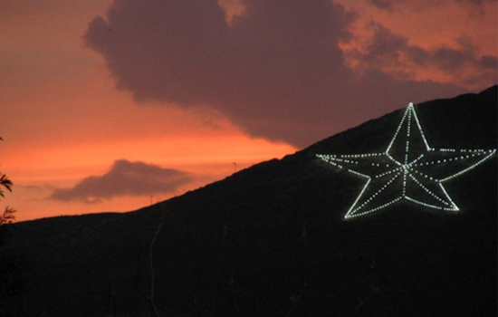 El Paso's Star on the Mountain Glows in Festive Red and Green, Promoting Unity this Christmas Eve