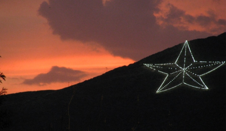 El Paso's Star on the Mountain Glows in Festive Red and Green, Promoting Unity this Christmas Eve