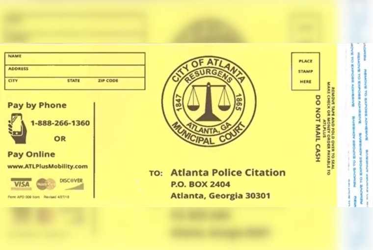 Fake Parking Ticket Scam Uncovered Near Mercedes-Benz Stadium During SEC Championship Rush