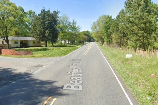 Huntersville School Bus Overturns on Beatties Ford Road, Driver Injured, No Children Onboard