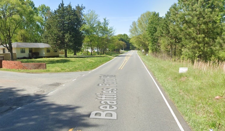 Huntersville School Bus Overturns on Beatties Ford Road, Driver Injured, No Children Onboard