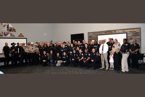 Lewisville Police Officers Bring Holiday Joy in "Shop with a Cop" Event with Local Children