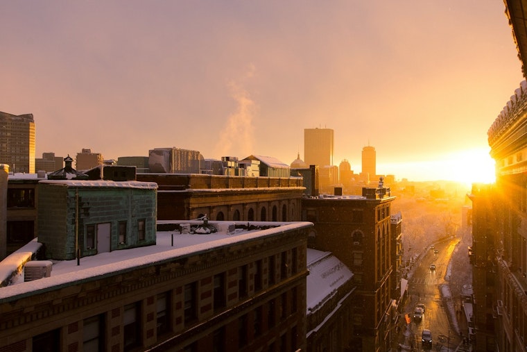 Light Snow Dusts Boston on Christmas Eve; Clear Skies Expected for Christmas Day