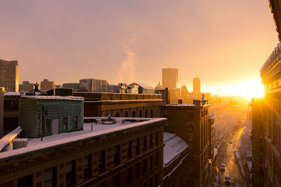 Light Snow Dusts Boston on Christmas Eve; Clear Skies Expected for Christmas Day