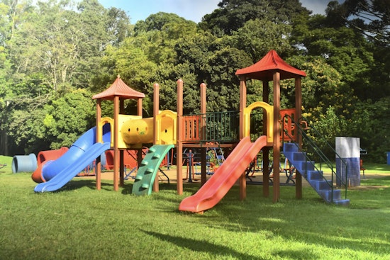 Marquette Seeks Public Input on Potential Dog Ban at Playgrounds Amid Safety Concerns