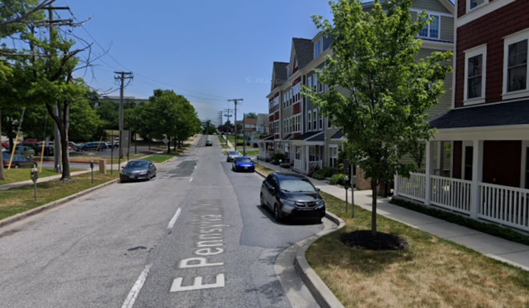 No Injuries Reported as Dump Truck Collides with Building in Towson, Prompting Investigation and Repairs