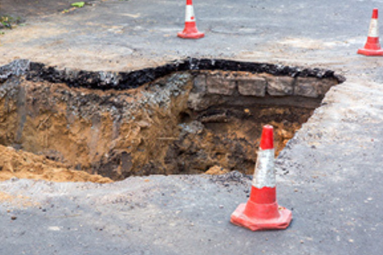 Ohio Supreme Court Rules Summit County May Face Liability for Home Damage Due to Road Collapse