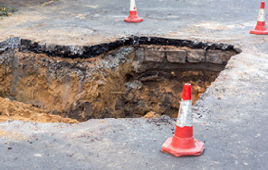 Ohio Supreme Court Rules Summit County May Face Liability for Home Damage Due to Road Collapse