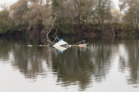 Sinking Boat on American River Spurs Swift Rescue Operations Near Sacramento Bridge