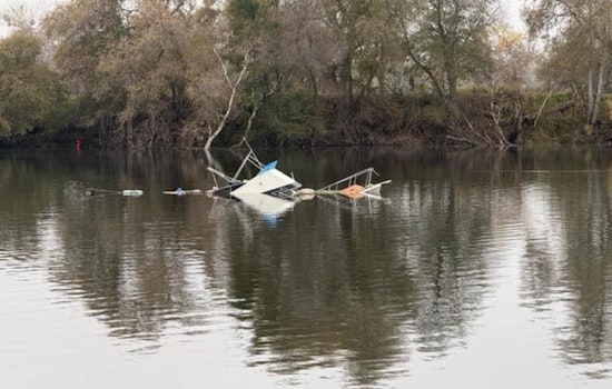 Sinking Boat on American River Spurs Swift Rescue Operations Near Sacramento Bridge