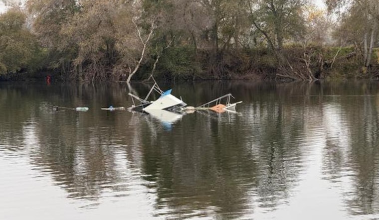Sinking Boat on American River Spurs Swift Rescue Operations Near Sacramento Bridge