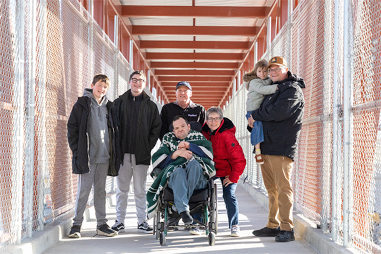 South Jordan Man in Wheelchair Celebrates as First to Cross UDOT's New Pedestrian Bridge